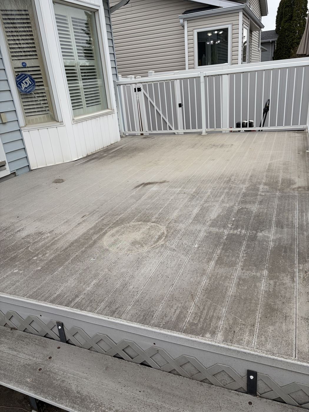 Dirty deck before pressure washing, Edmonton area home