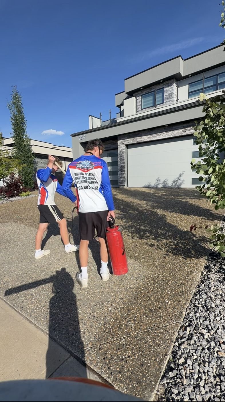 Wash & Shine Co. crew arriving for a driveway sealing job